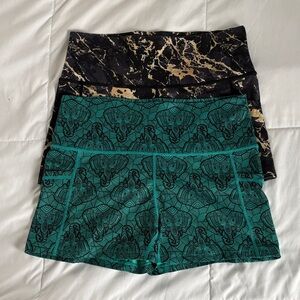 2 pairs of CVG workout shorts